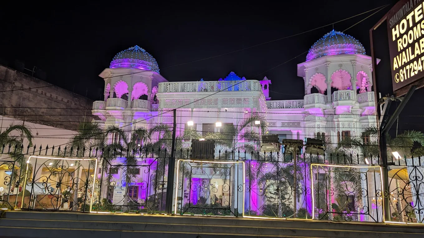 Shakuntala Palace facade and lawn at night